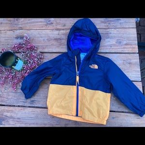 North Face Windbreaker 6-12mos. Blue and yellow.